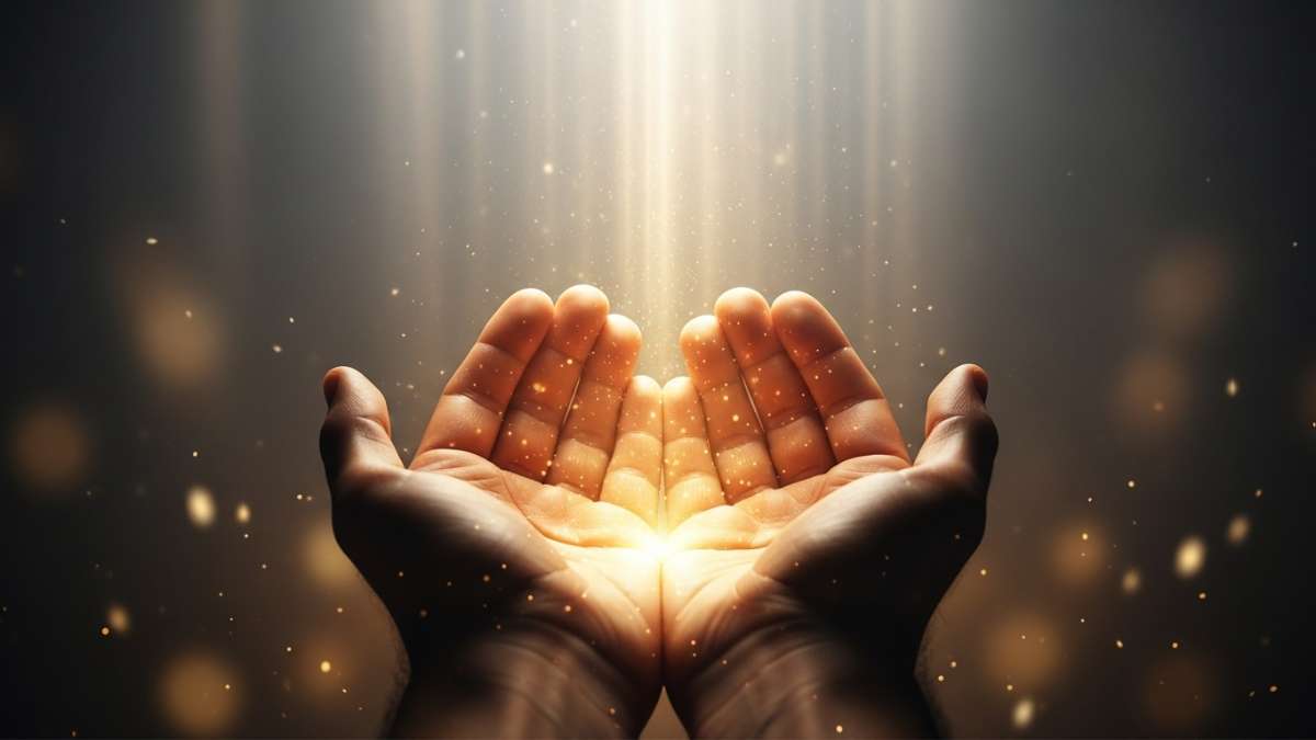Accept God's grace symbolized by open hands receiving divine light